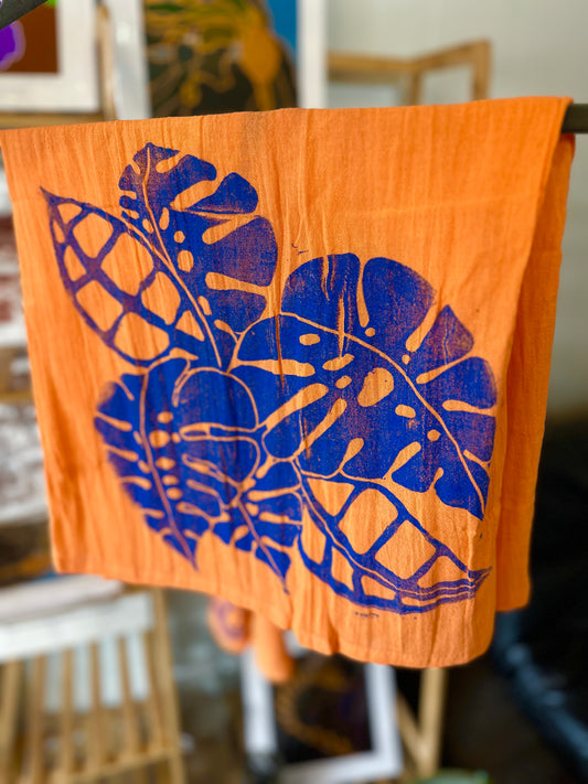 Blue Monstera Tea Towels in Orange